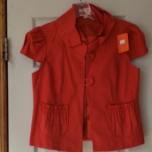 Full lined short sleeve orange button down shirt.